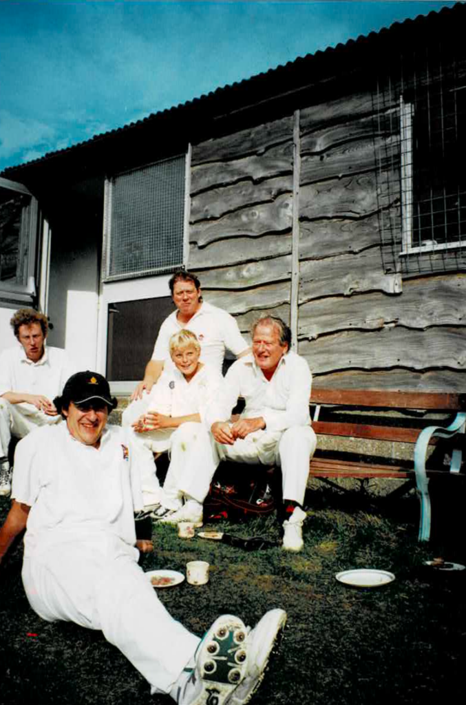 Chardstock cricket club, near Neville & Molly Marriner’s place in the country, was for many years the scene of an annual cricket match: Chardstock versus ASMF. Marriners father and son can be seen in this colour photo in front of the pavilion at the match held in 2001.